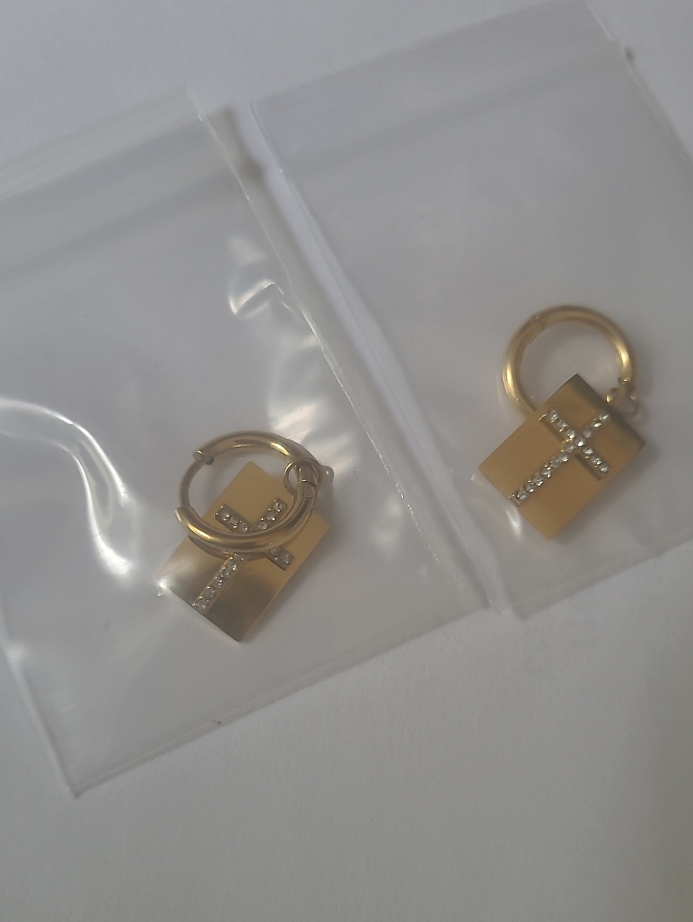 Plunder Gold Tone Cross Charm Hoop Earrings - Picture 2 of 3